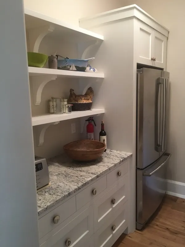 Custom storage cabinetry by Top Line Woodworking